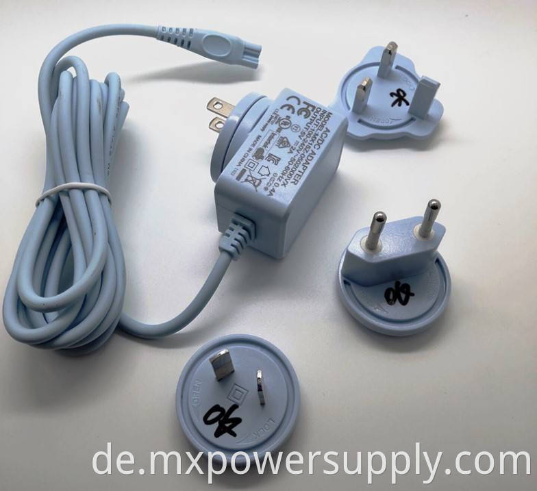 Universal 7.5V1.6A 12W 6v2a 9v1.5A 12V1.25A Universal -Leistungsadapter mit entfernbaren Steckern